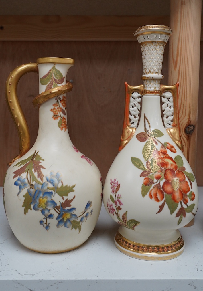 Two Worcester ivory ground vases, shape numbers 942 and 260, tallest 25.5cm. Condition - poor to fair, crack through dragons body at the highest point, wear to gilding of both pieces